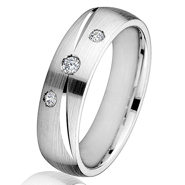 Item # G66766WE - 18kt white gold, diamond, comfort fit, wedding ring. There are 3 round brilliant cut diamonds set in the ring. The diamonds are 0.11 ct tw, VS1-2 in clarity and G-H in color. The ring is 6.0 mm wide with a mix of brush and polish finish. Other finishes may be selected or specified. 