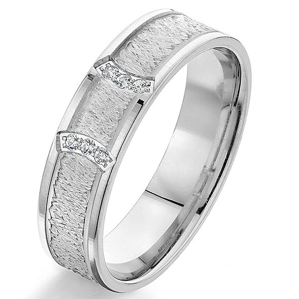 Item # G66970WE - 18kt white gold, contemporary, diamond comfort fit wedding ring. There are 6 round brilliant cut diamonds set in the ring. The diamonds are 0.06 ct tw, VS1-2 in clarity and G-H in color. The ring is 6.0 mm wide with a heavy carved finish in the center. 