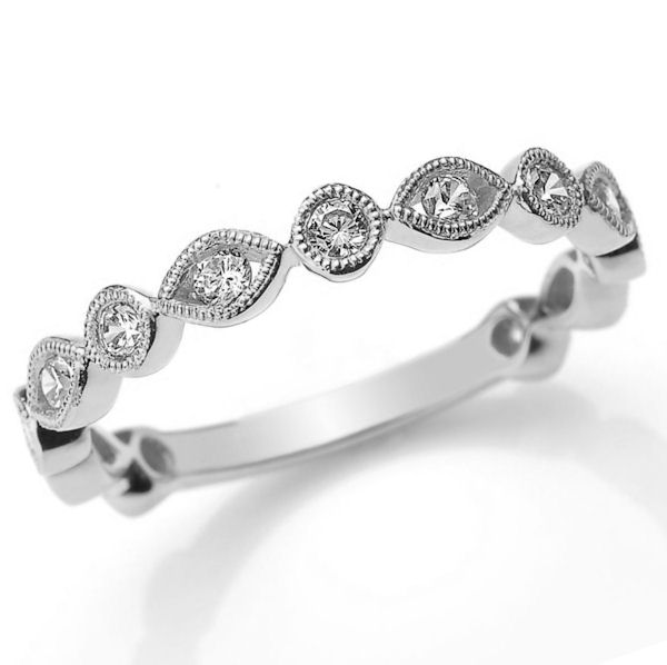 Item # M31888WE - 18kt white gold diamond anniversary and stackable ring. There are about 13 round brilliant cut diamonds set in the ring. The diamonds are about 0.40 ct tw, VS1-2 in clarity and G-H in color. 