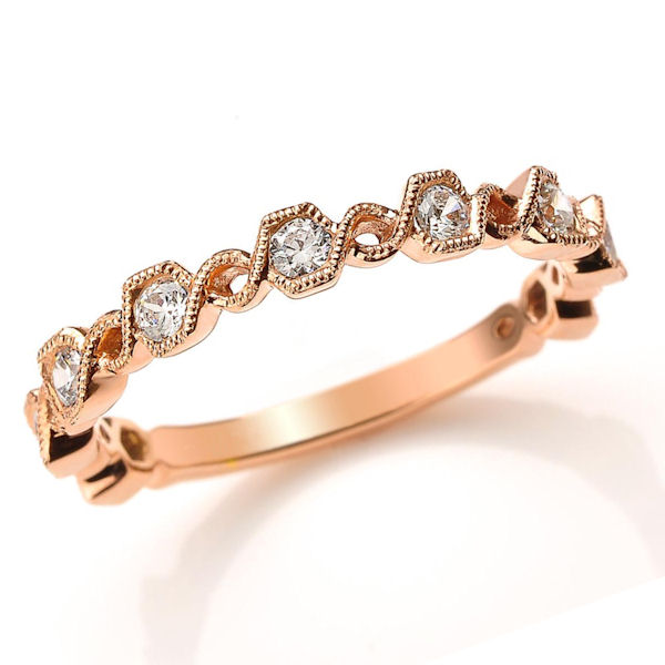Item # M31890R - 14kt rose gold diamond anniversary and stackable ring. There are about 9 round brilliant cut diamonds set in the ring with milgrain design around the ring. The diamonds are about 0.36 ct tw, VS1-2 in clarity and G-H in color. 