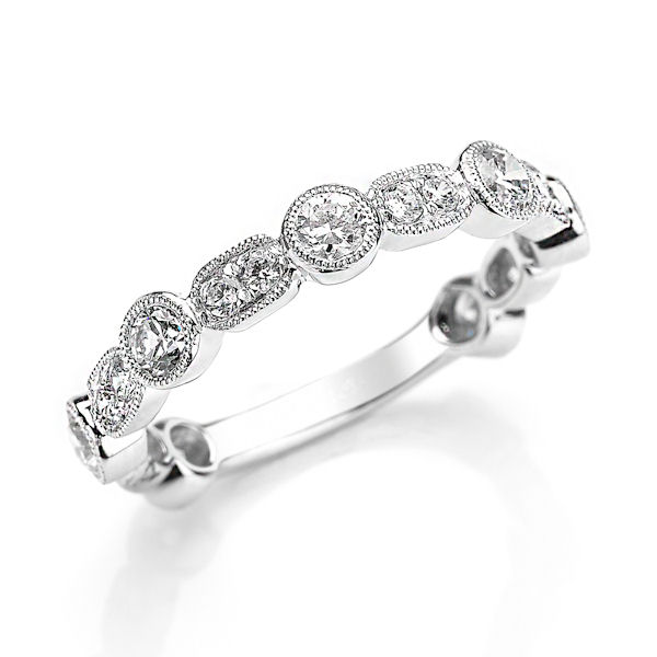 Item # M31901WE - 18kt white gold diamond anniversary and stackable ring. There are about 19 round brilliant cut diamonds set in the ring with milgrain edges around the diamonds. The diamonds are about 0.88 ct tw, VS1-2 in clarity and G-H in color. 