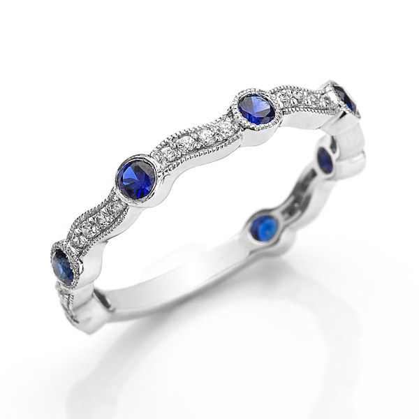 Item # M31902W - 14kt white gold diamond & sapphire anniversary and stackable ring. There are about 31 round brilliant cut diamonds and genuine blue sapphires. The diamonds are about 0.12 ct tw, VS1-2 in clarity, G-H in color and 0.37 ct tw genuine blue sapphires. 