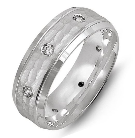 Item # M8967WE - 18K white gold, comfort fit, 7.0mm wide, center hammered, hand made diamond wedding band. The band has 8 diamonds with total weight of 0.30ct. The diamonds are graded as VS in Clarity, G-H in Color.