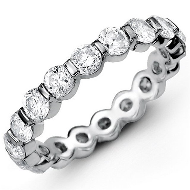 Item # MS20039W - 14K white gold diamond eternity bend. The band bar set holds 14 round brilliant cut diamonds with total weigh of 5.0ct in size 6.0. The diamonds are graded as VS in Clarity G-H in Color.