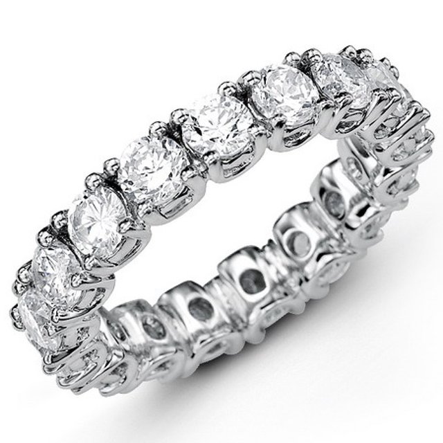 Item # MS20043PP - Platinum diamond eternity band. The band set in prongs  holds 16 round brilliant cut diamonds with total weigh of 4.0ct in size 6.0. The diamonds are graded as VS in Clarity G-H in Color.