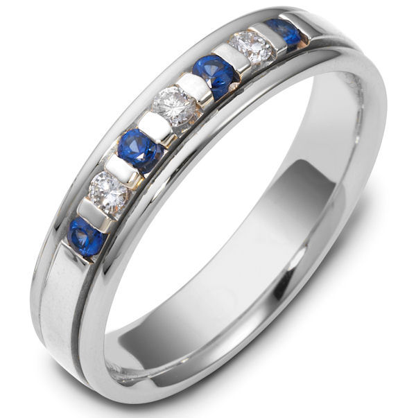 Item # S47243NW - 14kt White gold sapphire, diamond, comfort fit, 4.5mm wide wedding band. The ring has approximately 0.12 ct tw diamonds, VS1-2 in clarity and G-H in color, and about 0.24 ct tw genuine sapphires. There are 3 round brilliant cut diamonds and 4 round genuine sapphires. It is 4.5mm wide and comfort fit. The center is brushed and the rest of the ring is polished. Other finishes may be selected or specified.