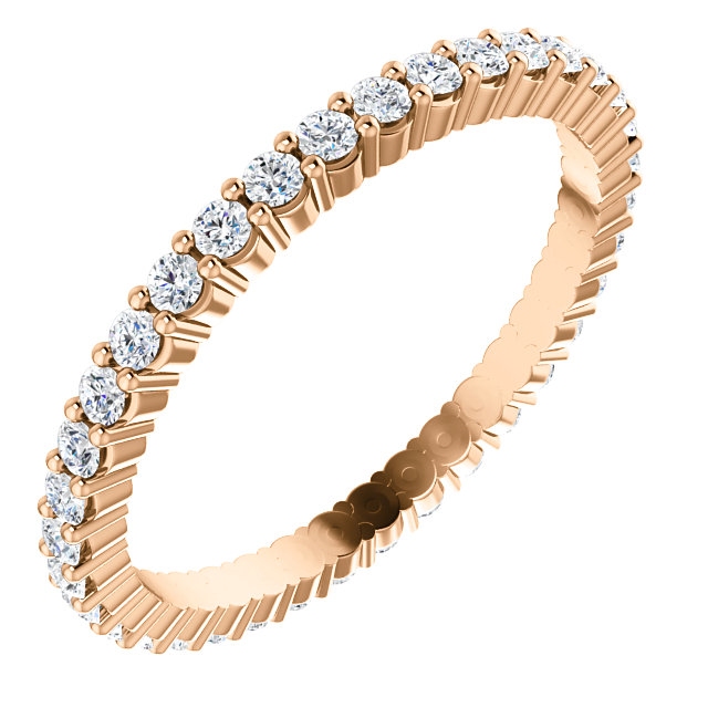 Item # SR127785050R - 14K rose gold eternity band. The band in size 6.0 holds 36 round brilliant cut diamonds with total weight of approximately 0.50ct. The diamonds are graded as VS in clarity G-H in color.