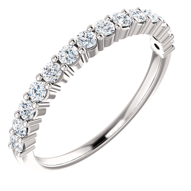Item # SR128555050PP - Platinum 14 diamonds anniversary band. The diamonds together weigh 0.5ct and are graded as SI1 in clarity G-H in color.