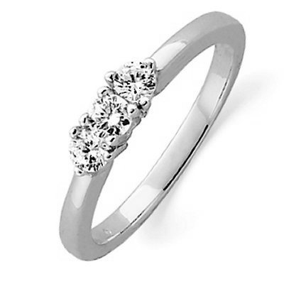 Item # ST12022425PP - Platinum ring holds three round brilliant cut diamonds with total weight 0.25 ct. The diamonds are graded as VS1-2 in clarity G-H in color. The finish on the ring is polished. Other finishes may be selected or specified.